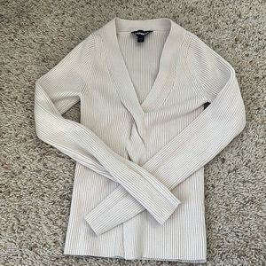 cream colored long sleeve criss-crossed express heavy long sleeve